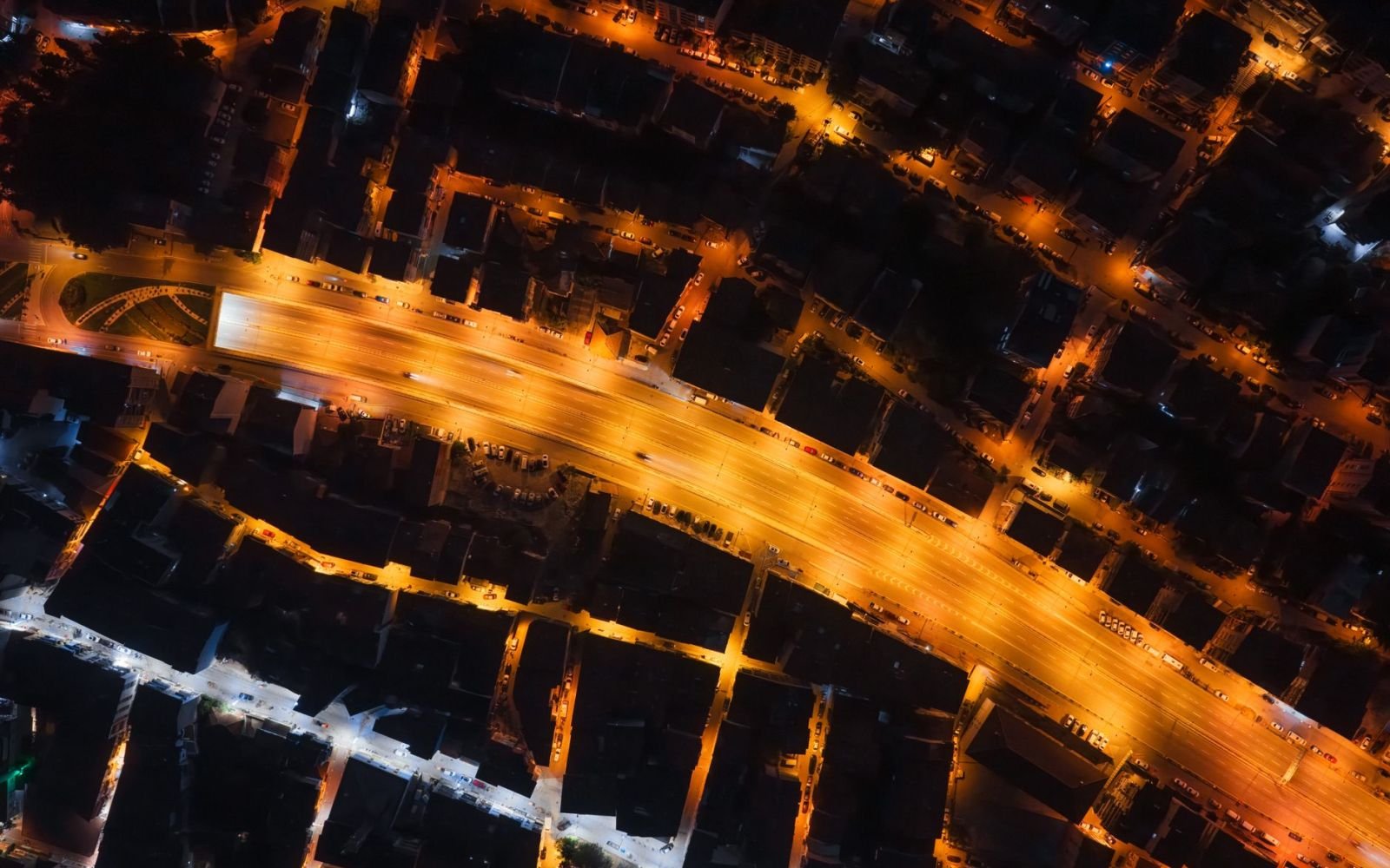 City traffic flowing at night, seen from above